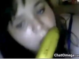Apaļas kamera jauns dāma ar a banāns