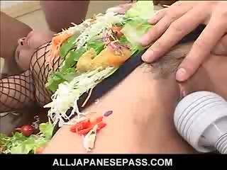 Jap AV doll turned into an edible table for hard up chaps
